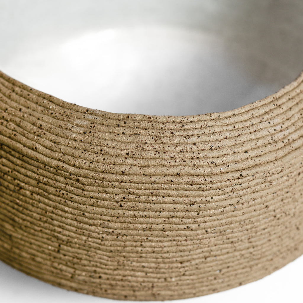 Ceramic vessel handmade by Mali Taylor, a Melbourne based ceramic artist currently exploring the parameters of coil methodology within her practice.