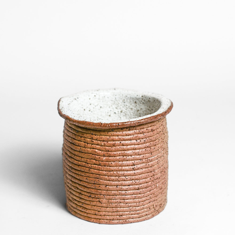 Ceramic vessel handmade by Mali Taylor, a Melbourne based ceramic artist currently exploring the parameters of coil methodology within her practice.