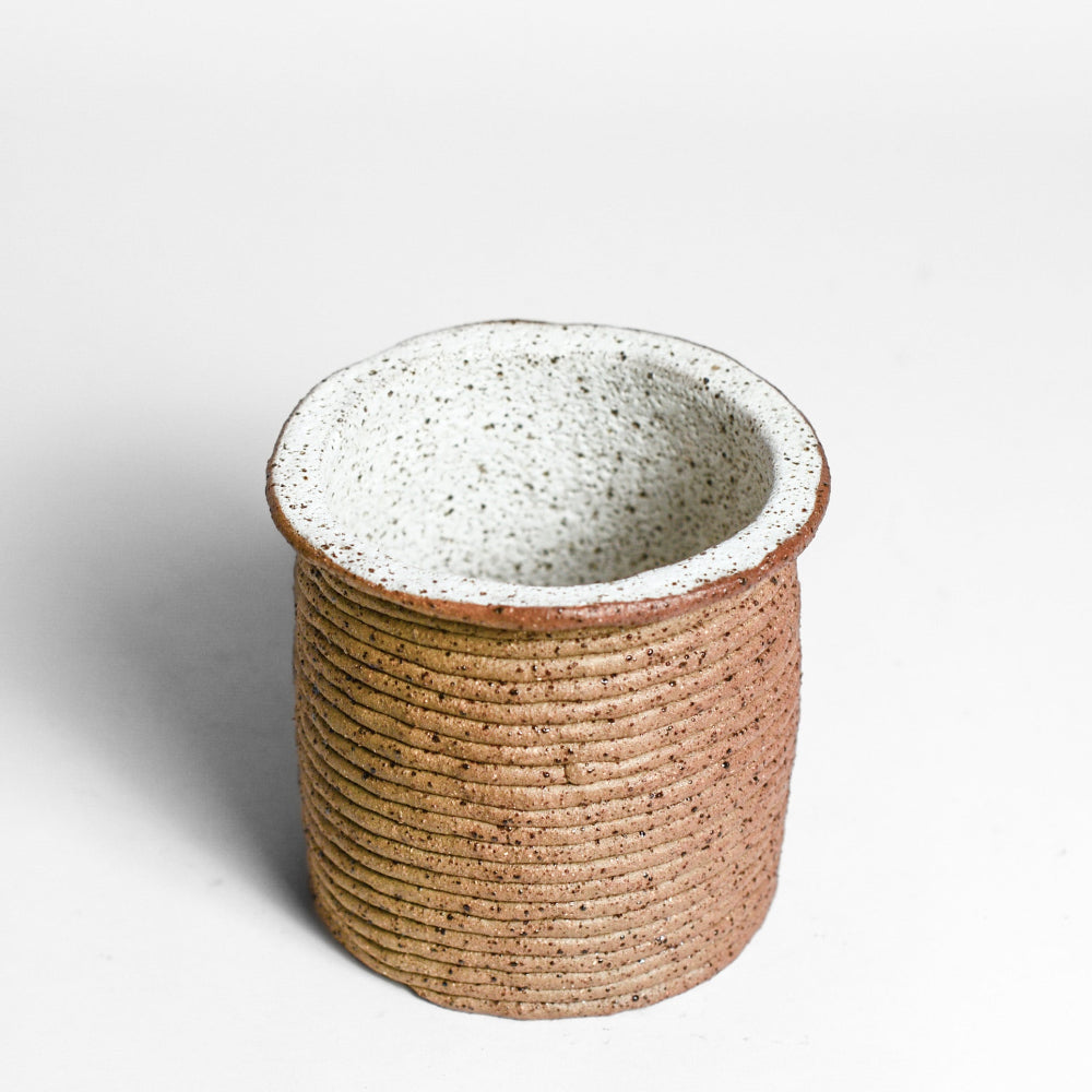 Ceramic vessel handmade by Mali Taylor, a Melbourne based ceramic artist currently exploring the parameters of coil methodology within her practice.