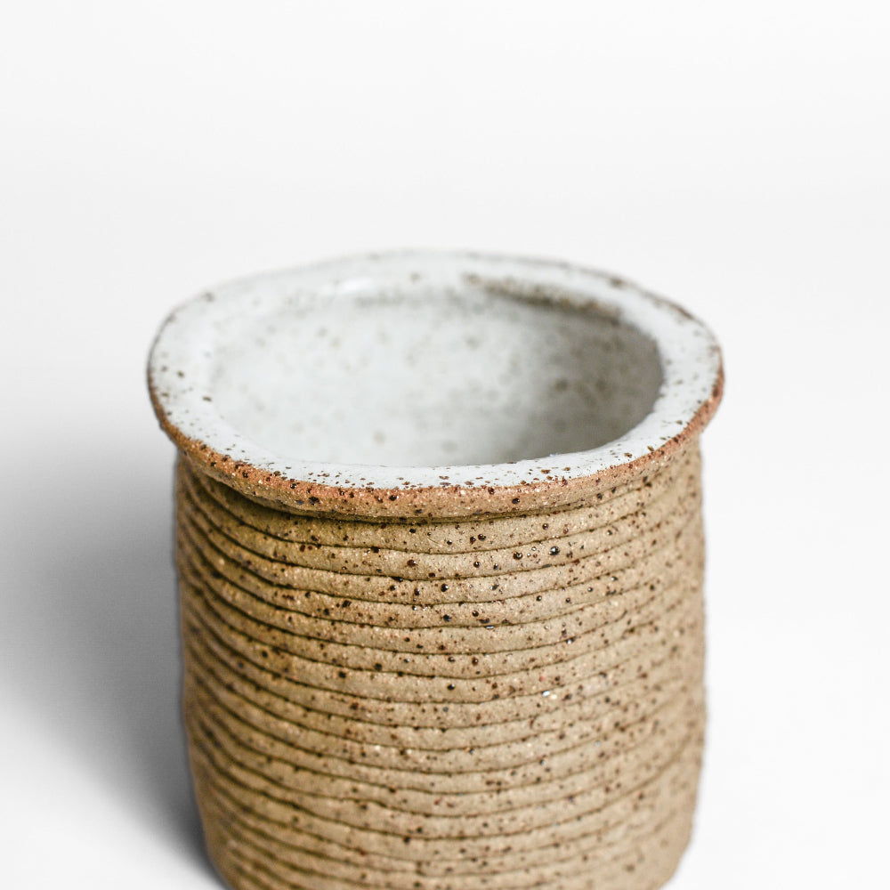Ceramic vessel handmade by Mali Taylor, a Melbourne based ceramic artist currently exploring the parameters of coil methodology within her practice.