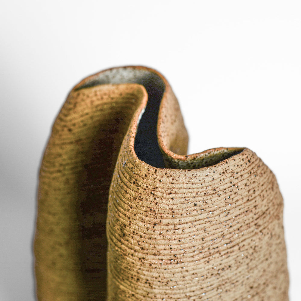 Ceramic vessel handmade by Mali Taylor, a Melbourne based ceramic artist currently exploring the parameters of coil methodology within her practice.