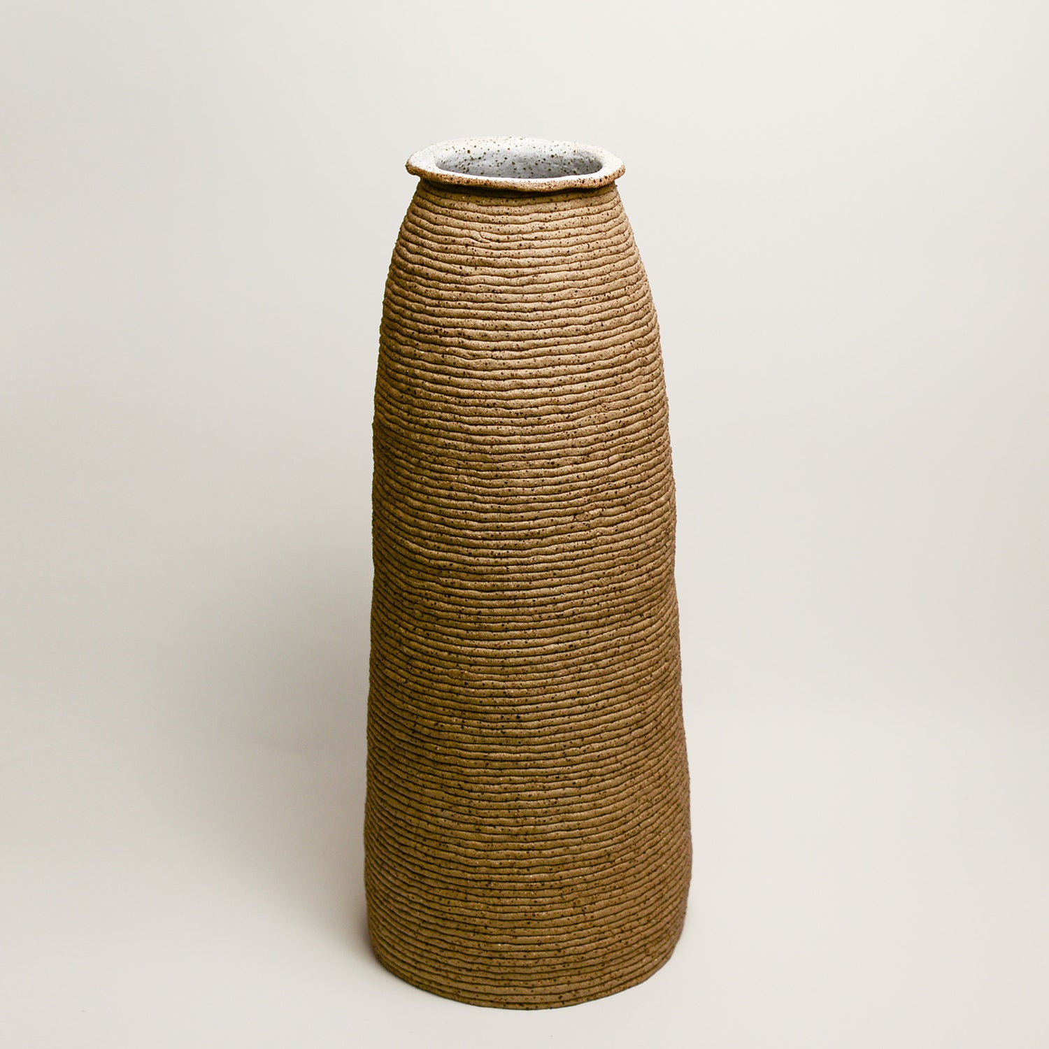 Ceramic vessel handmade by Mali Taylor, a Melbourne based ceramic artist currently exploring the parameters of coil methodology within her practice.