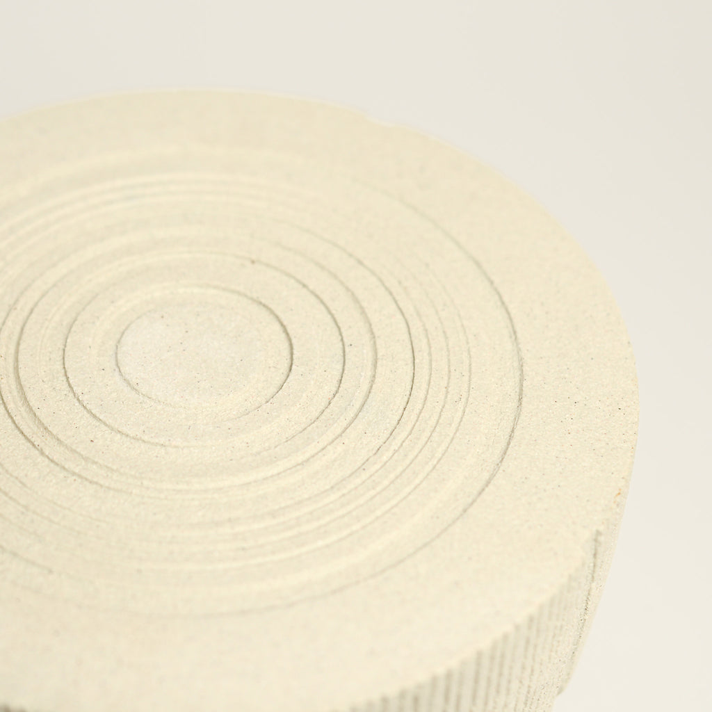 From her small studio in the Dandenong Ranges, Melinda Wallis strives for beauty in the form and surface. Simple designs can prove challenging, however this keeps her engaged as she continues to search for that one perfect piece. that enigma. She uses textured clays, often blending two or three together. The wheel gives Melinda her individual parts, and her hands assemble the finished product. The process is by far the main event for Melinda.