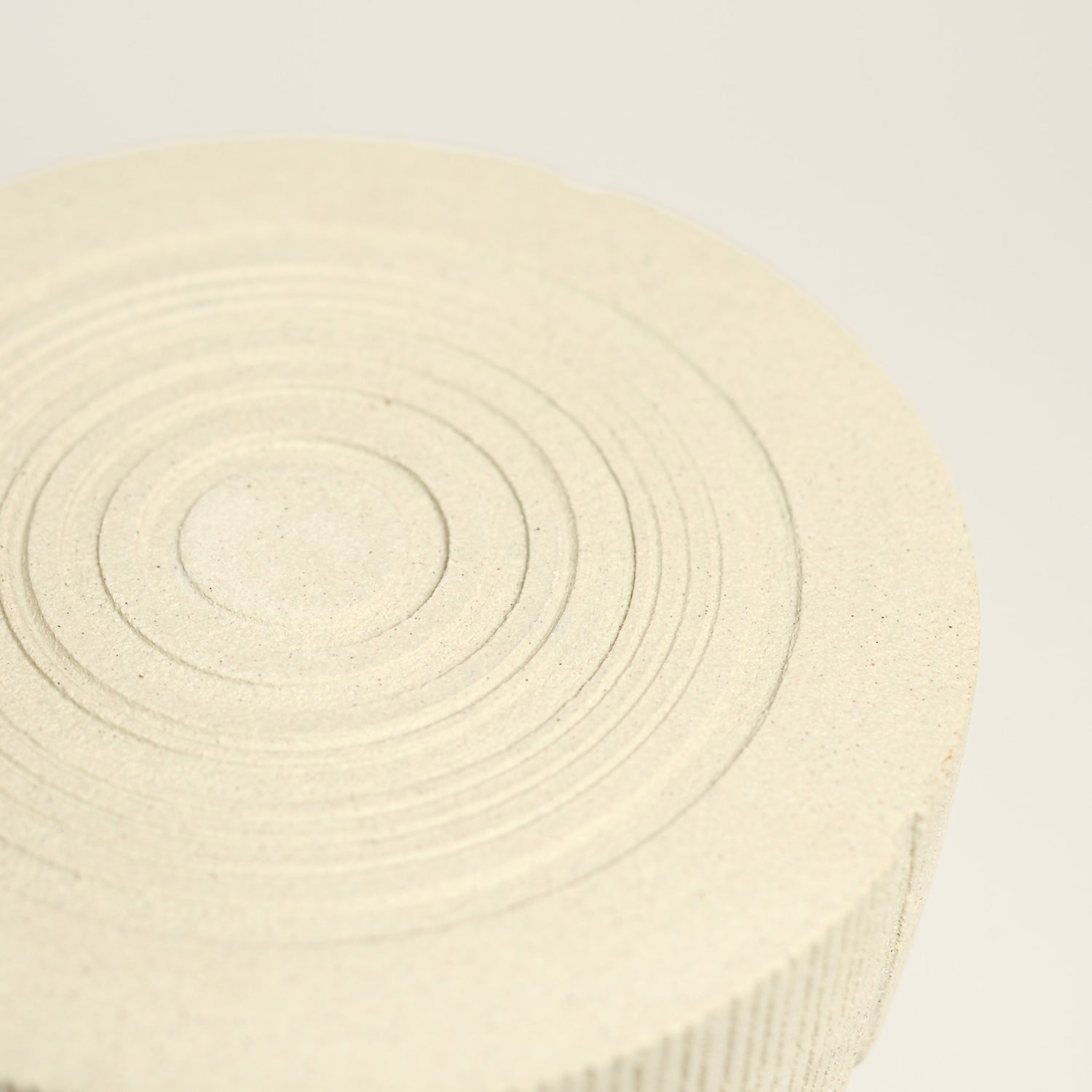 From her small studio in the Dandenong Ranges, Melinda Wallis strives for beauty in the form and surface. Simple designs can prove challenging, however this keeps her engaged as she continues to search for that one perfect piece. that enigma. She uses textured clays, often blending two or three together. The wheel gives Melinda her individual parts, and her hands assemble the finished product. The process is by far the main event for Melinda.