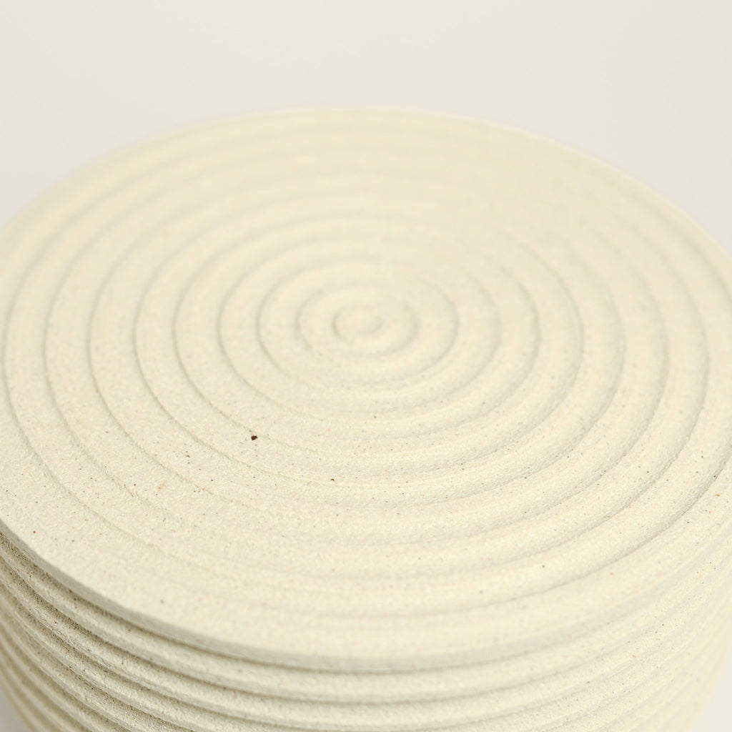 From her small studio in the Dandenong Ranges, Melinda Wallis strives for beauty in the form and surface. Simple designs can prove challenging, however this keeps her engaged as she continues to search for that one perfect piece. that enigma. She uses textured clays, often blending two or three together. The wheel gives Melinda her individual parts, and her hands assemble the finished product. The process is by far the main event for Melinda.