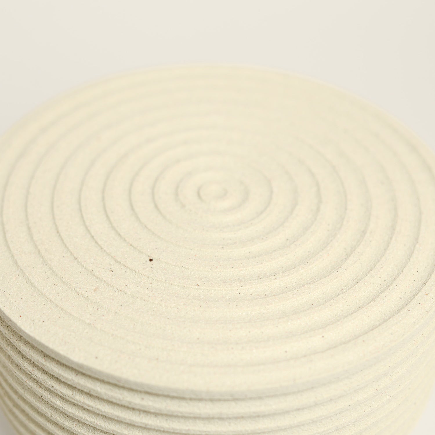 From her small studio in the Dandenong Ranges, Melinda Wallis strives for beauty in the form and surface. Simple designs can prove challenging, however this keeps her engaged as she continues to search for that one perfect piece. that enigma. She uses textured clays, often blending two or three together. The wheel gives Melinda her individual parts, and her hands assemble the finished product. The process is by far the main event for Melinda.