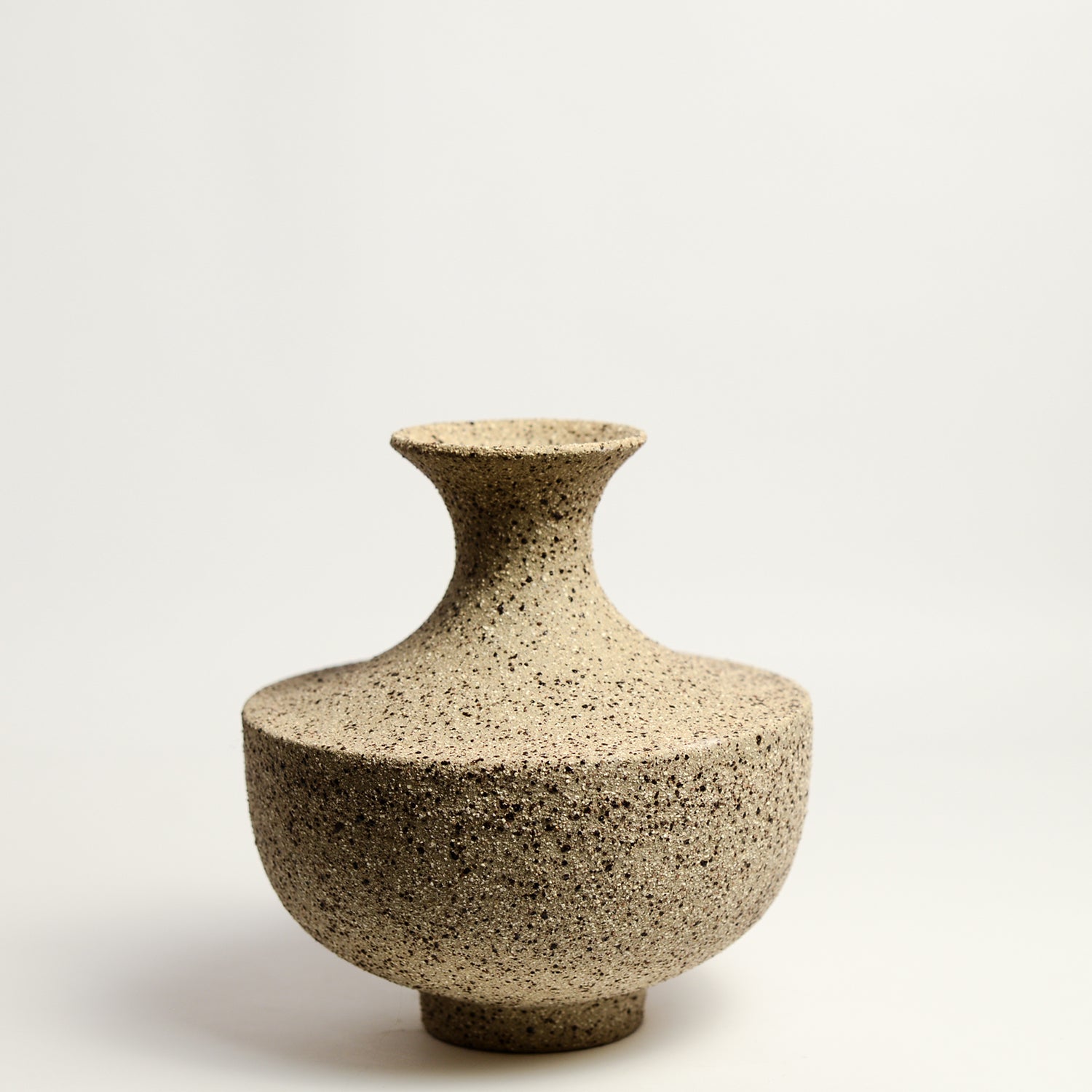 From her small studio in the Dandenong Ranges, Melinda Wallis strives for beauty in the form and surface. Simple designs can prove challenging, however this keeps her engaged as she continues to search for that one perfect piece. that enigma. She uses textured clays, often blending two or three together. The wheel gives Melinda her individual parts, and her hands assemble the finished product. The process is by far the main event for Melinda.