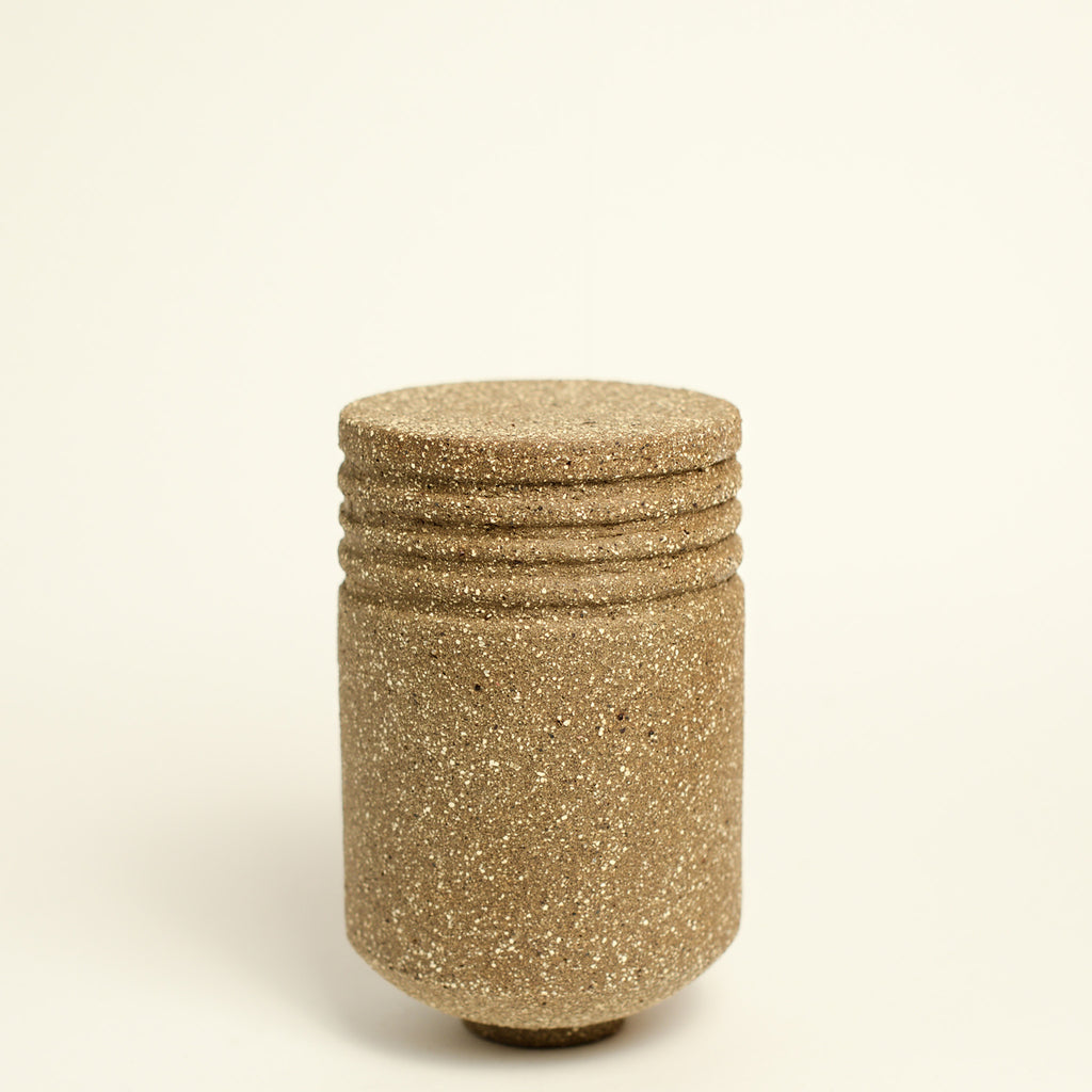 From her small studio in the Dandenong Ranges, Melinda Wallis strives for beauty in the form and surface. Simple designs can prove challenging, however this keeps her engaged as she continues to search for that one perfect piece. that enigma. She uses textured clays, often blending two or three together. The wheel gives Melinda her individual parts, and her hands assemble the finished product. The process is by far the main event for Melinda.