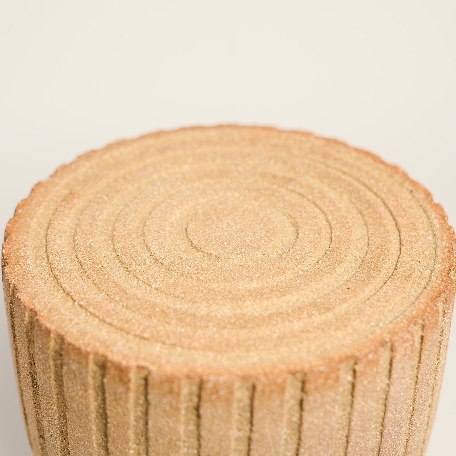 From her small studio in the Dandenong Ranges, Melinda Wallis strives for beauty in the form and surface. Simple designs can prove challenging, however this keeps her engaged as she continues to search for that one perfect piece. that enigma. She uses textured clays, often blending two or three together. The wheel gives Melinda her individual parts, and her hands assemble the finished product. The process is by far the main event for Melinda.