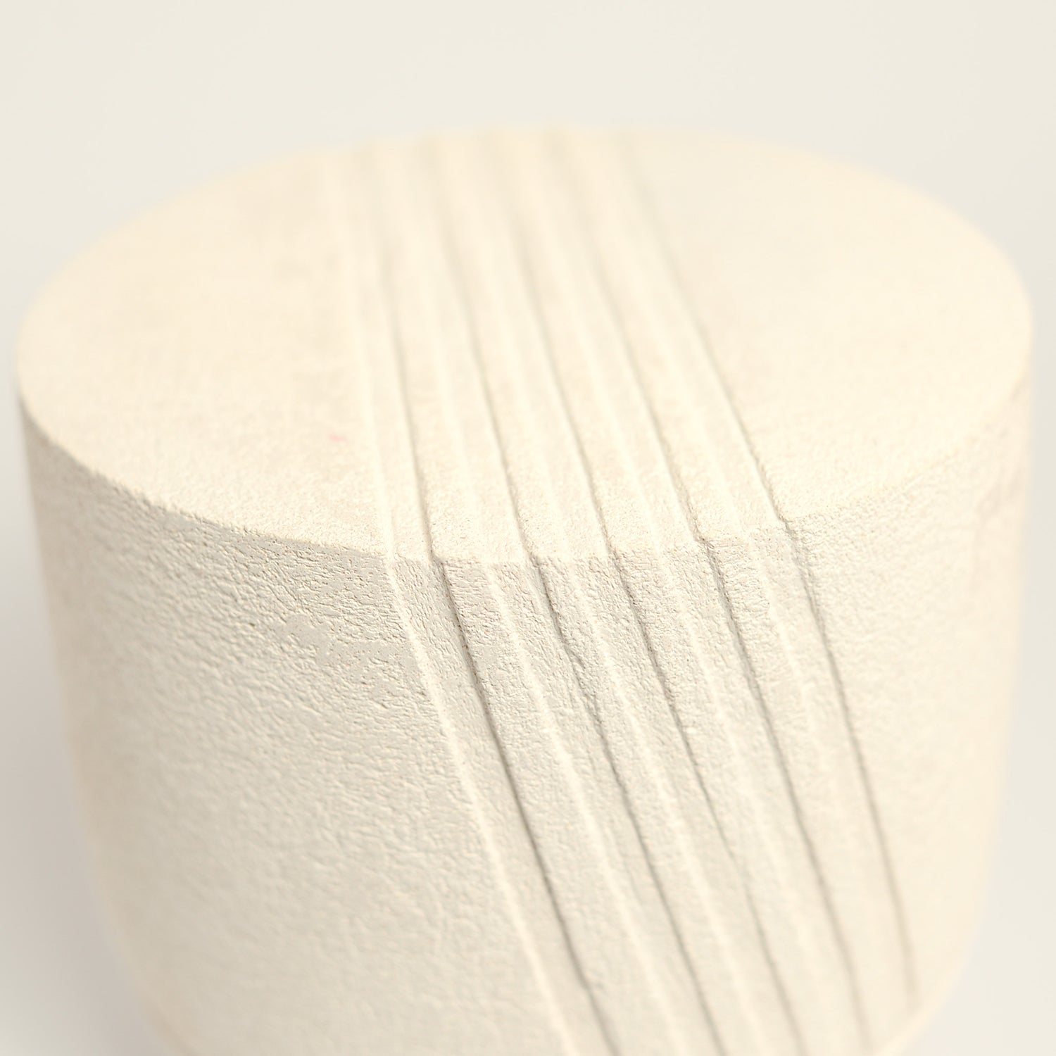 From her small studio in the Dandenong Ranges, Melinda Wallis strives for beauty in the form and surface. Simple designs can prove challenging, however this keeps her engaged as she continues to search for that one perfect piece. that enigma. She uses textured clays, often blending two or three together. The wheel gives Melinda her individual parts, and her hands assemble the finished product. The process is by far the main event for Melinda.