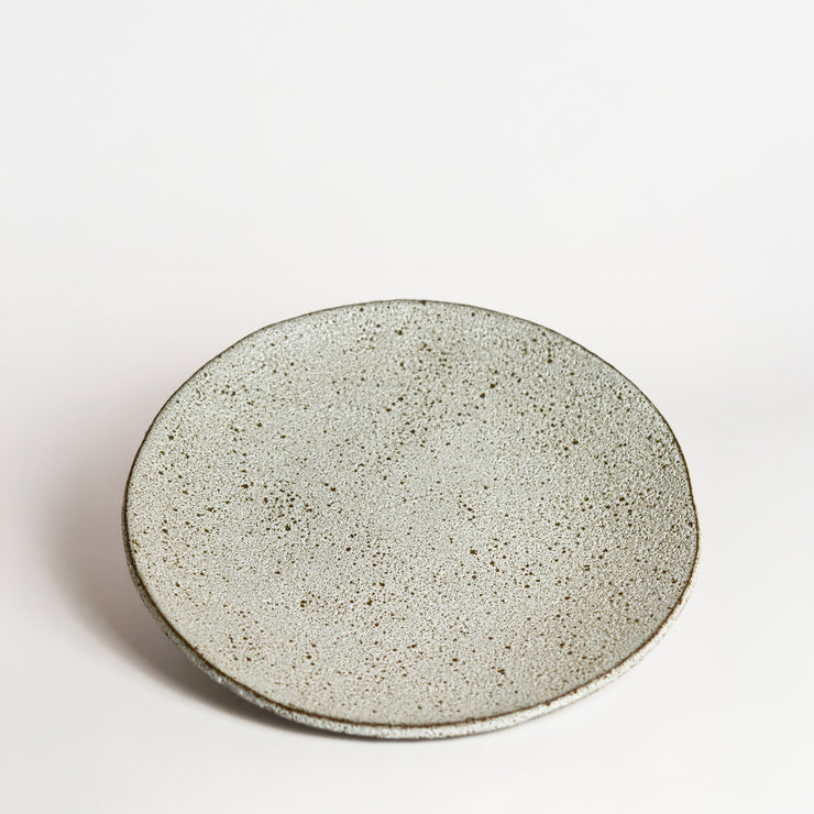 Ceramic platter handmade by London born, Melbourne based potter Sharon Alpren. Sharon makes sculptural, yet practical pieces for the home. The characteristics of the clay, the glaze and the fire direct her hand-built and wheel-thrown contemporary ceramics. 