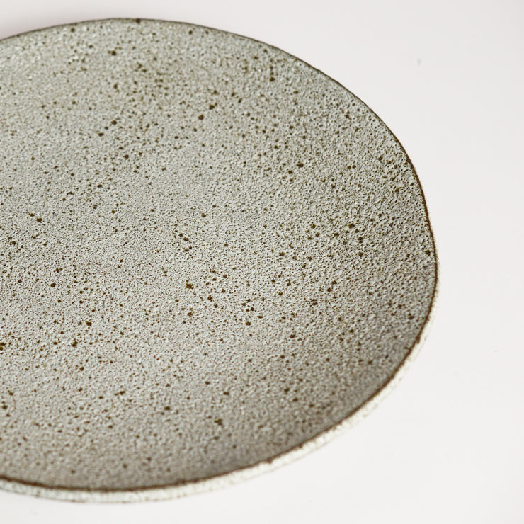 Ceramic platter handmade by London born, Melbourne based potter Sharon Alpren. Sharon makes sculptural, yet practical pieces for the home. The characteristics of the clay, the glaze and the fire direct her hand-built and wheel-thrown contemporary ceramics. 