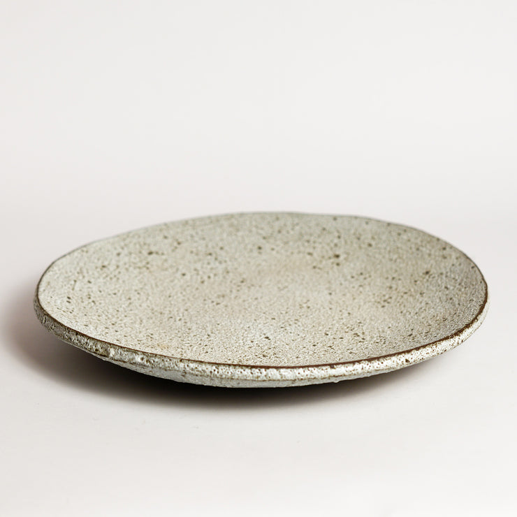 Ceramic platter handmade by London born, Melbourne based potter Sharon Alpren. Sharon makes sculptural, yet practical pieces for the home. The characteristics of the clay, the glaze and the fire direct her hand-built and wheel-thrown contemporary ceramics. 