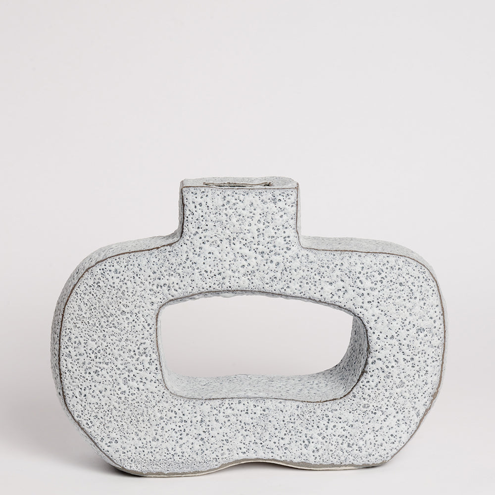 Ceramic Vase handmade by London born, Melbourne based potter Sharon Alpren. Sharon makes sculptural, yet practical pieces for the home. The characteristics of the clay, the glaze and the fire direct her hand-built and wheel-thrown contemporary ceramics. 