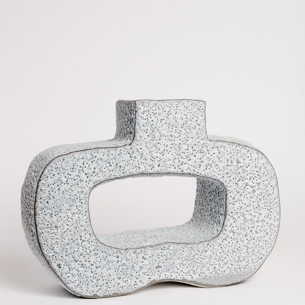 Ceramic Vase handmade by London born, Melbourne based potter Sharon Alpren. Sharon makes sculptural, yet practical pieces for the home. The characteristics of the clay, the glaze and the fire direct her hand-built and wheel-thrown contemporary ceramics. 