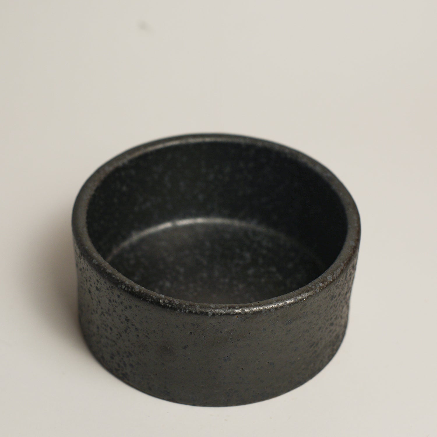 SHARON ALPREN is a Melbourne based ceramic artist based in the Macedon Ranges. Working predominantly with richly coloured and textured stoneware clays and glazes, her work strikes a balance between creating both functional and sculptural pieces for the home. Sharon took up ceramics 15 years ago after relocating to Australia from her native UK where she had a background in Textiles.