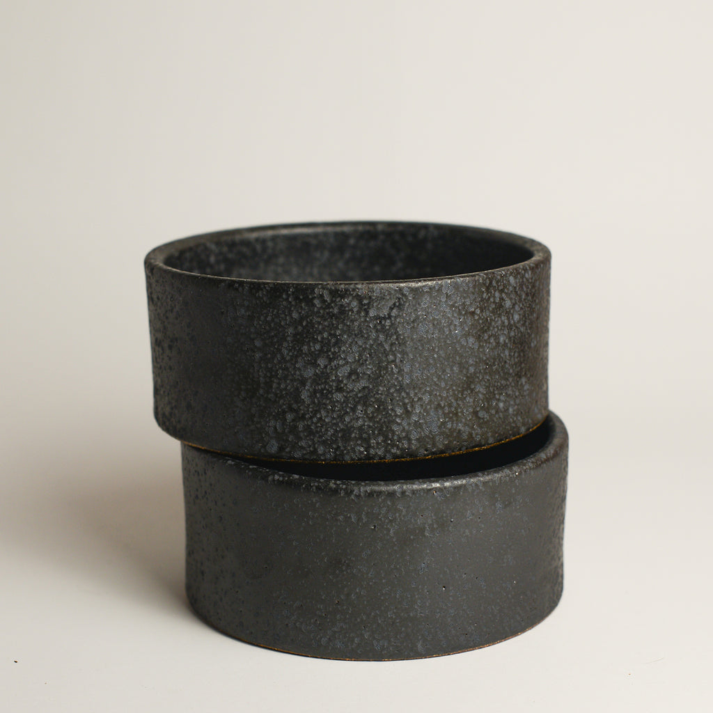 SHARON ALPREN is a Melbourne based ceramic artist based in the Macedon Ranges. Working predominantly with richly coloured and textured stoneware clays and glazes, her work strikes a balance between creating both functional and sculptural pieces for the home. Sharon took up ceramics 15 years ago after relocating to Australia from her native UK where she had a background in Textiles.