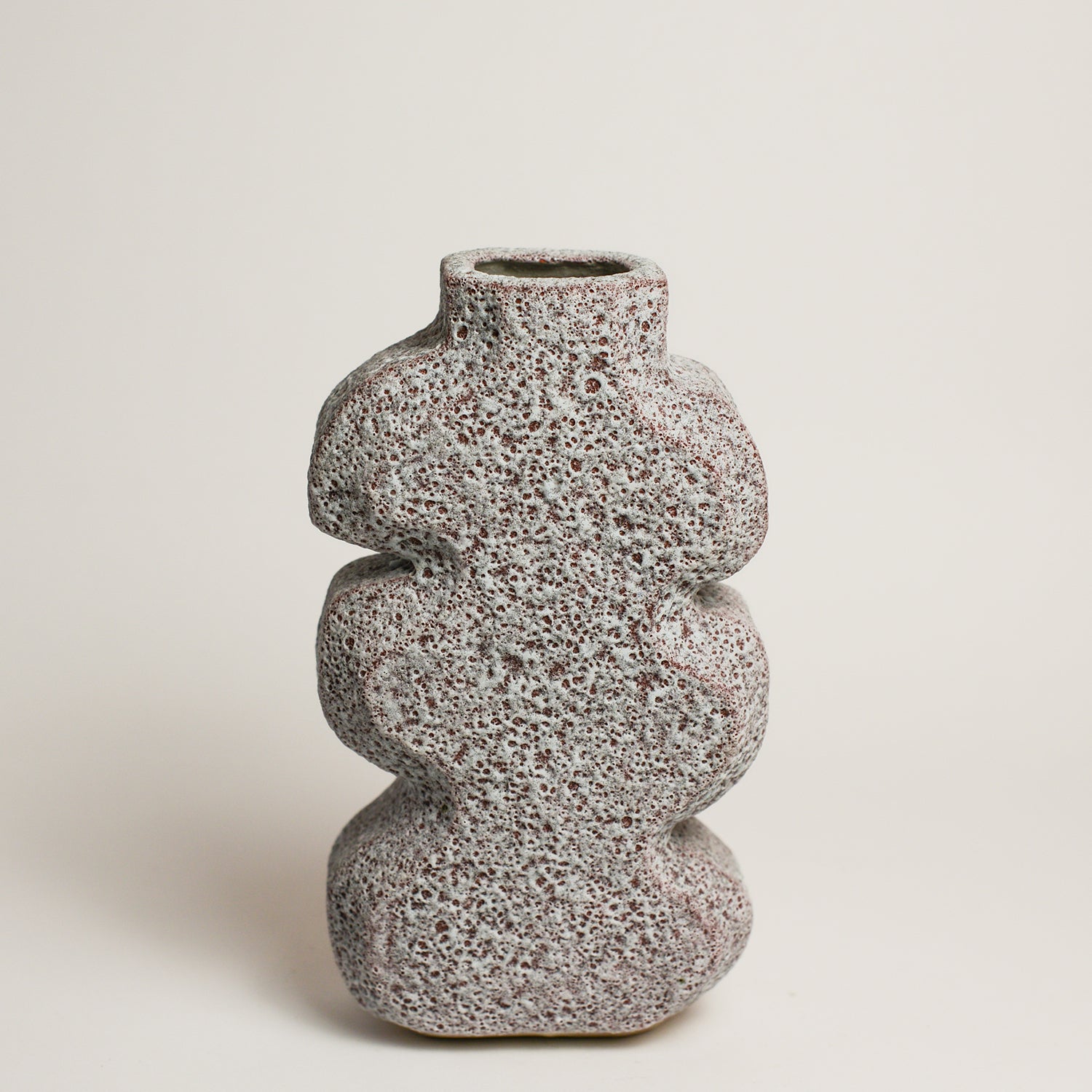 Ceramic Vase handmade by London born, Melbourne based potter Sharon Alpren. Sharon makes sculptural, yet practical pieces for the home. The characteristics of the clay, the glaze and the fire direct her hand-built and wheel-thrown contemporary ceramics. 