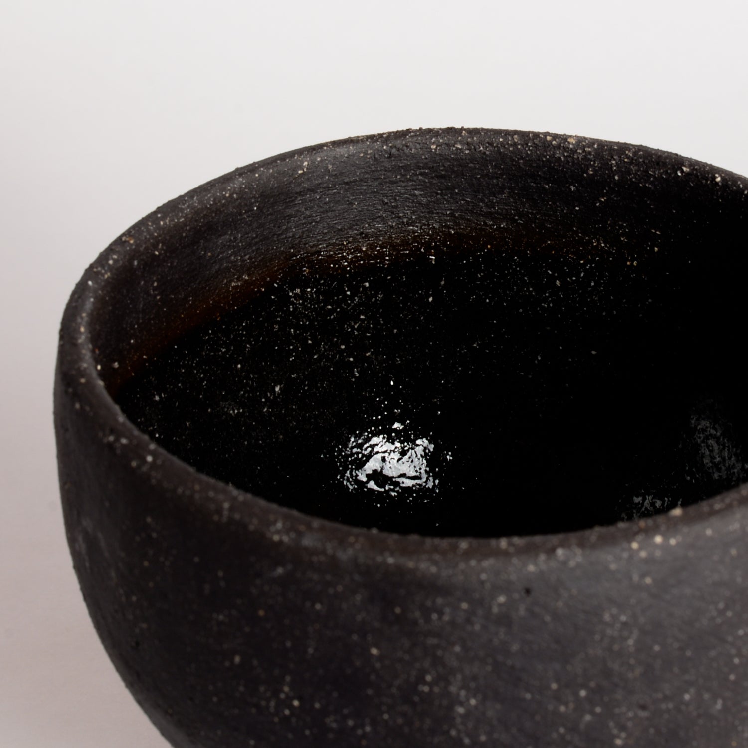 Tiny Black Ceramic Vessel