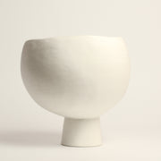 Ceramic porcelain vase handmade by Simone Karras using handbuilding techniques. Simone is an Australian ceramicist based in Melbourne where she creates contemporary ceramics using handbuilding techniques and playing with scale.