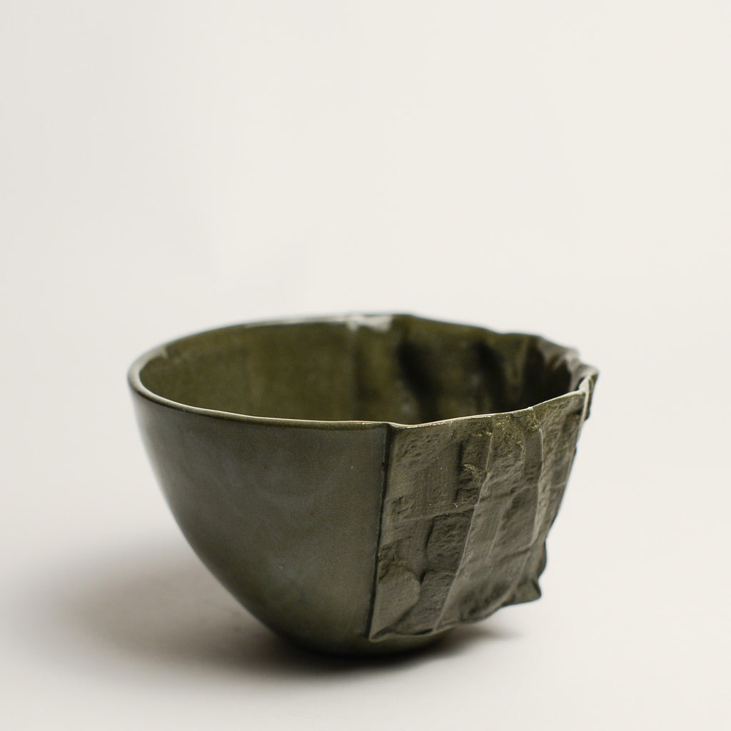 Small porcelain vase handmade by Perth-based ceramicist Annemieke Mulders. Inspired by elements found in nature, Annemieke predominantly works with slipcasting techniques to create contemporary ceramics with interesting forms and tactile surfaces using fine porcelain and stoneware clays. 