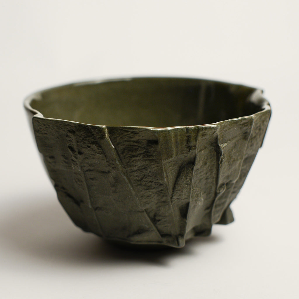 Small porcelain vase handmade by Perth-based ceramicist Annemieke Mulders. Inspired by elements found in nature, Annemieke predominantly works with slipcasting techniques to create contemporary ceramics with interesting forms and tactile surfaces using fine porcelain and stoneware clays. 