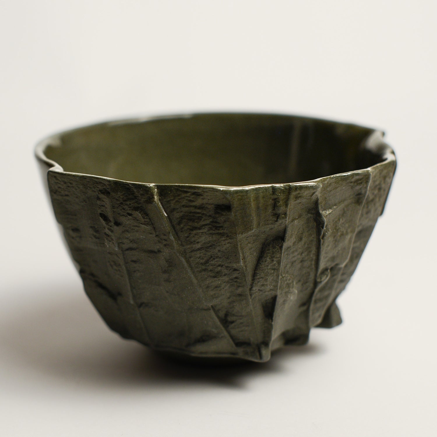 Small porcelain vase handmade by Perth-based ceramicist Annemieke Mulders. Inspired by elements found in nature, Annemieke predominantly works with slipcasting techniques to create contemporary ceramics with interesting forms and tactile surfaces using fine porcelain and stoneware clays. 