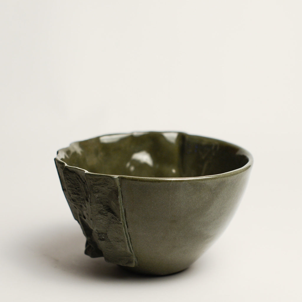 Small porcelain vase handmade by Perth-based ceramicist Annemieke Mulders. Inspired by elements found in nature, Annemieke predominantly works with slipcasting techniques to create contemporary ceramics with interesting forms and tactile surfaces using fine porcelain and stoneware clays. 