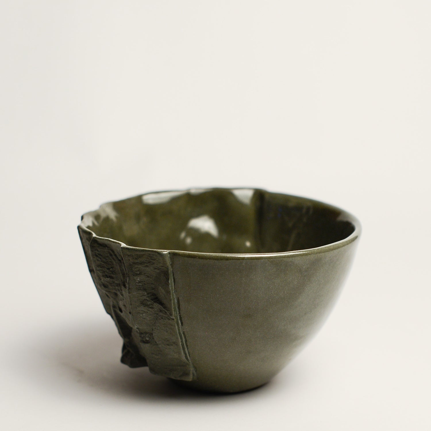 Small porcelain vase handmade by Perth-based ceramicist Annemieke Mulders. Inspired by elements found in nature, Annemieke predominantly works with slipcasting techniques to create contemporary ceramics with interesting forms and tactile surfaces using fine porcelain and stoneware clays. 