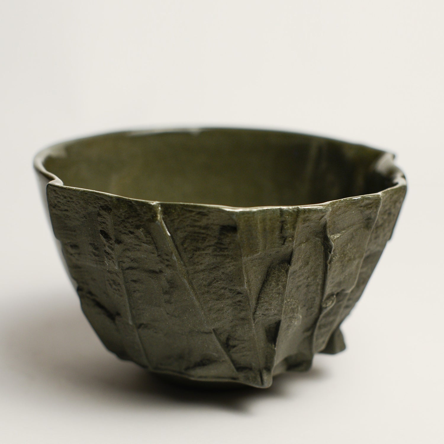 Small porcelain vase handmade by Perth-based ceramicist Annemieke Mulders. Inspired by elements found in nature, Annemieke predominantly works with slipcasting techniques to create contemporary ceramics with interesting forms and tactile surfaces using fine porcelain and stoneware clays. 