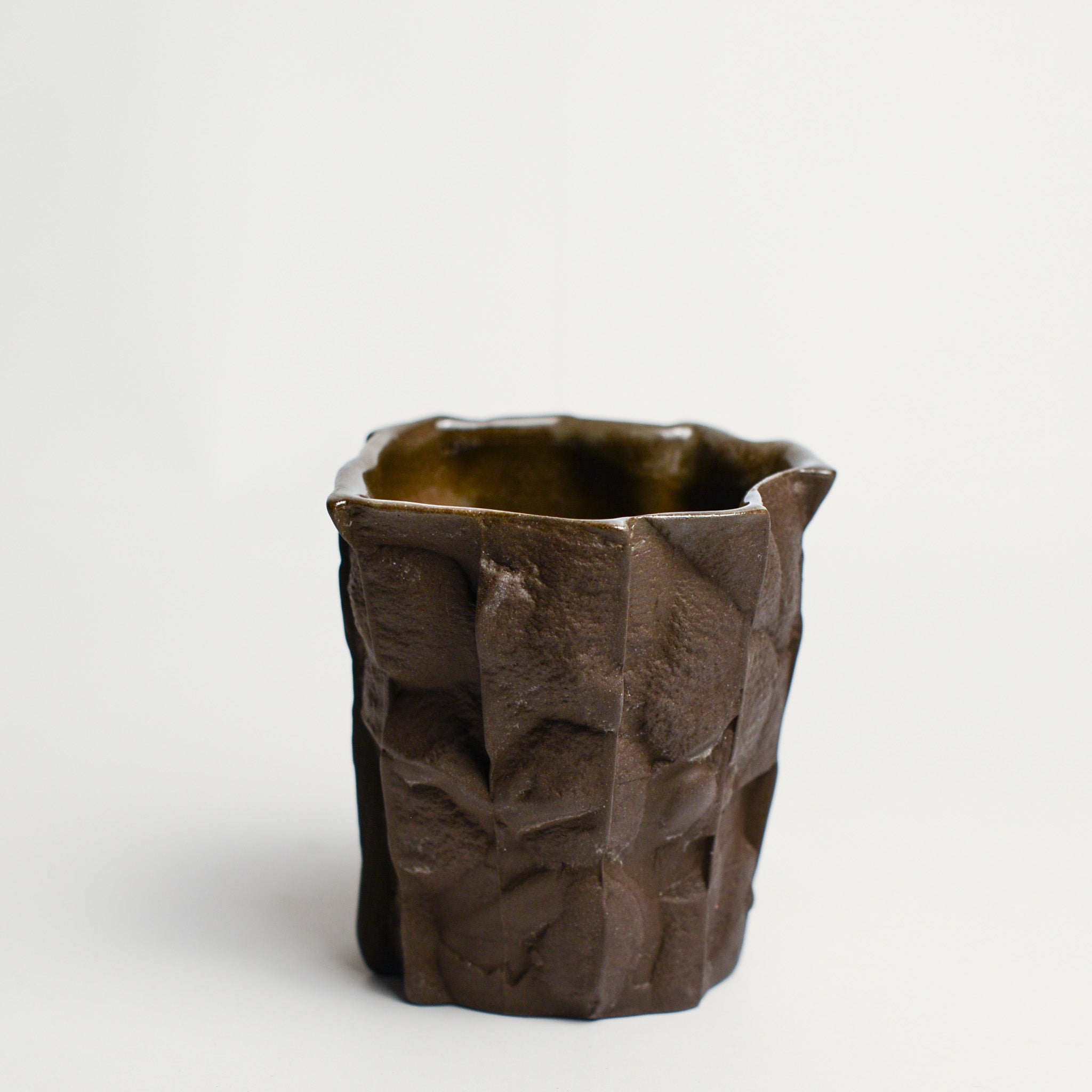 Small porcelain vase handmade by Perth-based ceramicist Annemieke Mulders. Inspired by elements found in nature, Annemieke predominantly works with slipcasting techniques to create contemporary ceramics with interesting forms and tactile surfaces using fine porcelain and stoneware clays.