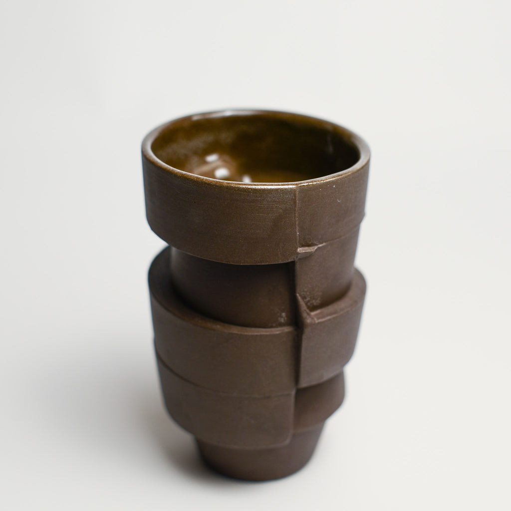 Small porcelain vase handmade by Perth-based ceramicist Annemieke Mulders. Inspired by elements found in nature, Annemieke predominantly works with slipcasting techniques to create contemporary ceramics with interesting forms and tactile surfaces using fine porcelain and stoneware clays.