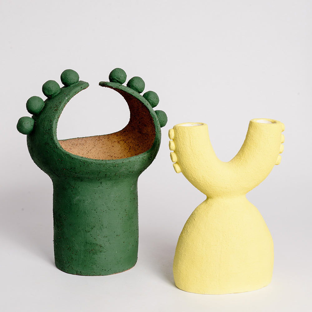 STEPHANIE PHILLIPS is a ceramic artist from Sydney, Australia. Through her background and upbringing, Stephanie has developed an affinity with the Australian bush and the influence of the forms and colours of native flora are evident in her contemporary ceramic sculptures.