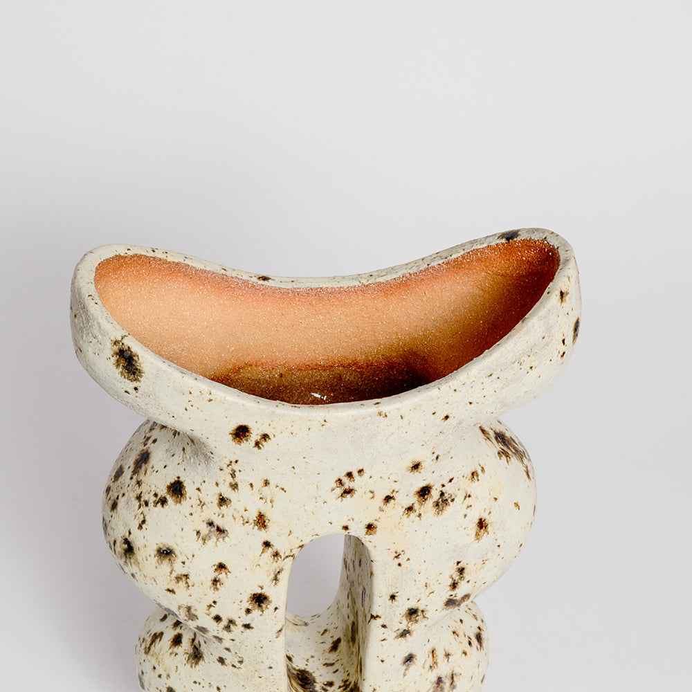 STEPHANIE PHILLIPS is a ceramic artist from Sydney, Australia. Through her background and upbringing, Stephanie has developed an affinity with the Australian bush and the influence of the forms and colours of native flora are evident in her contemporary ceramic sculptures.