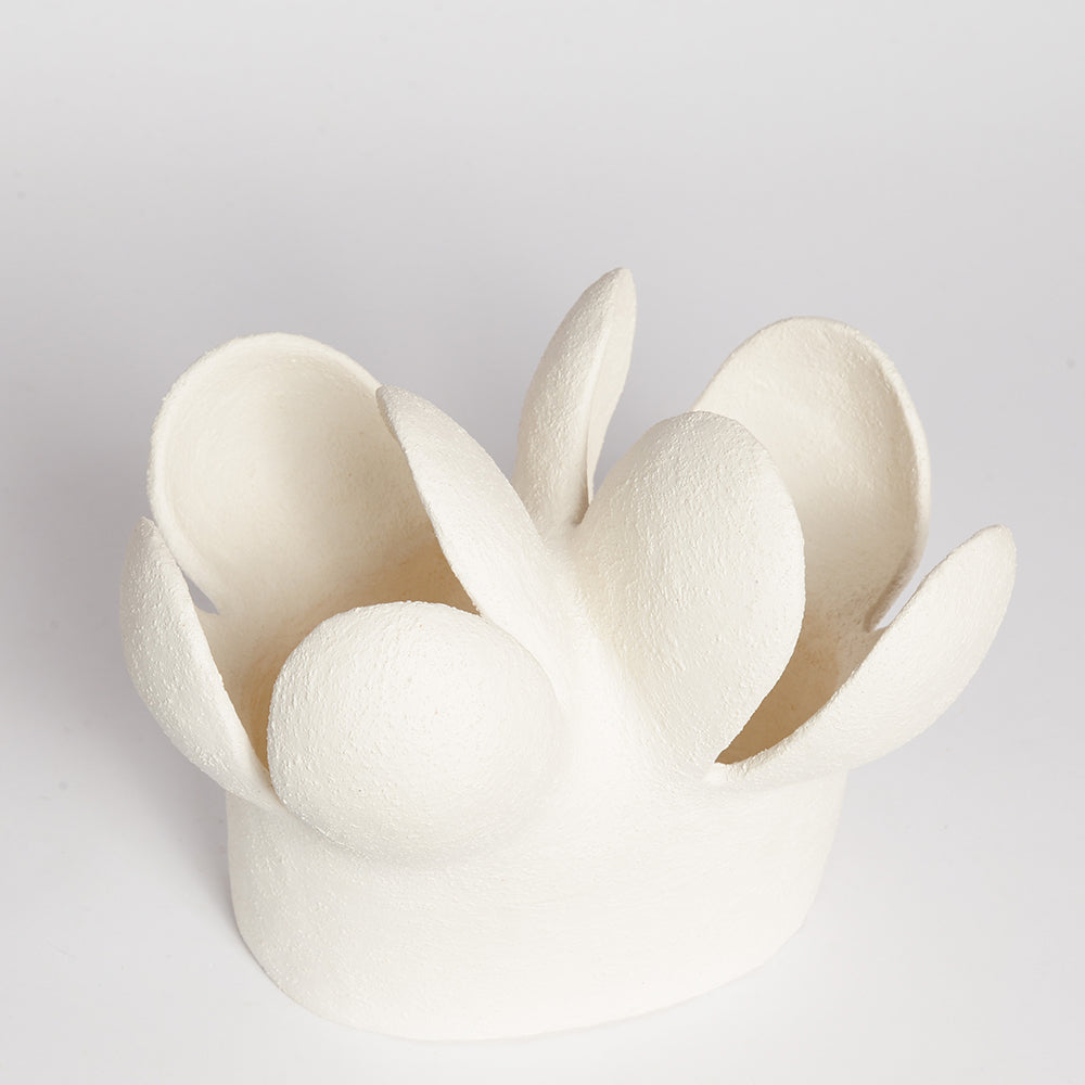 STEPHANIE PHILLIPS is a ceramic artist from Sydney, Australia. Through her background and upbringing, Stephanie has developed an affinity with the Australian bush and the influence of the forms and colours of native flora are evident in her contemporary ceramic sculptures.