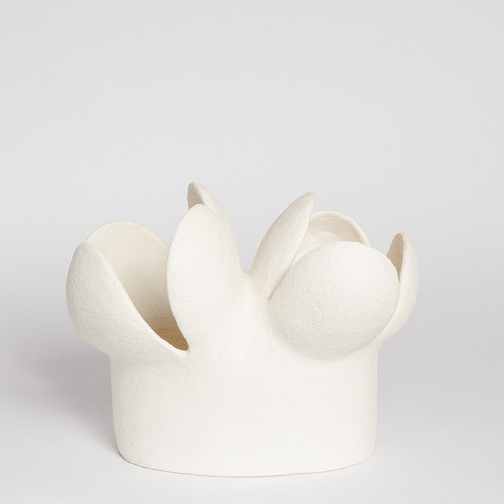 STEPHANIE PHILLIPS is a ceramic artist from Sydney, Australia. Through her background and upbringing, Stephanie has developed an affinity with the Australian bush and the influence of the forms and colours of native flora are evident in her contemporary ceramic sculptures.