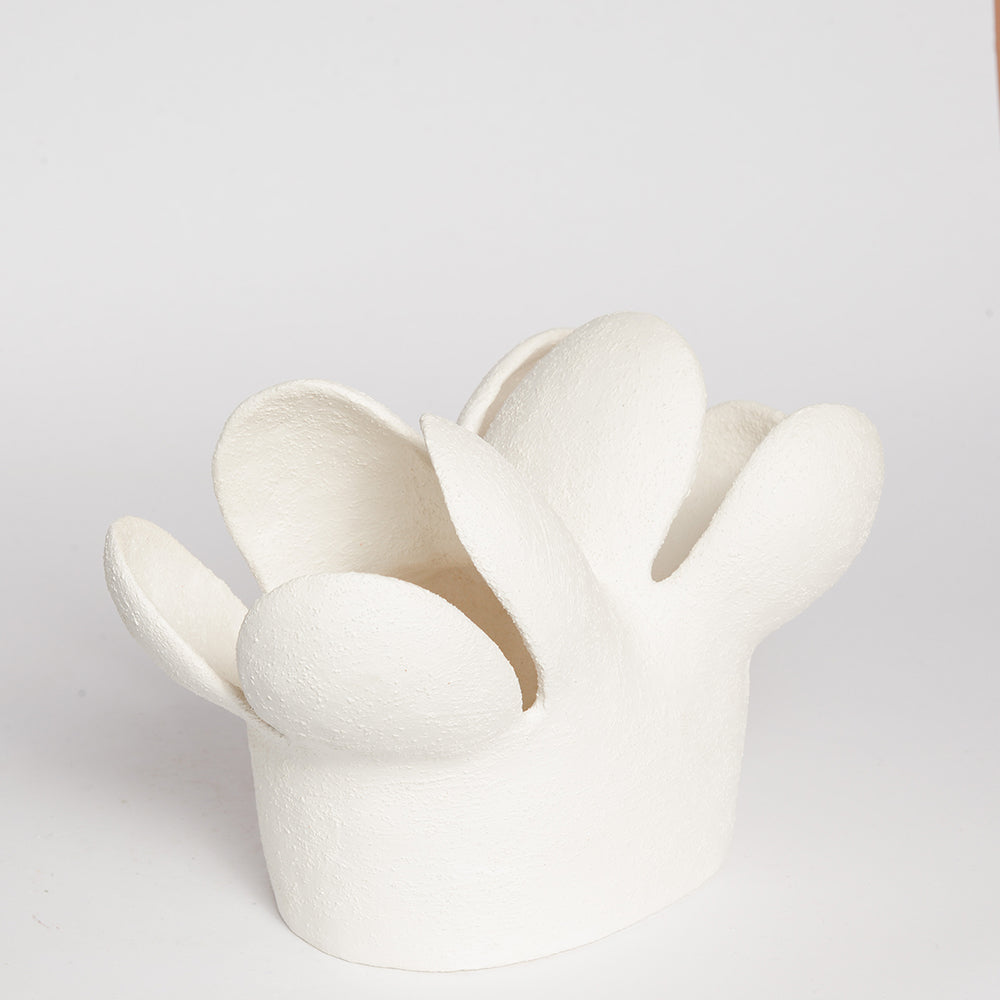 STEPHANIE PHILLIPS is a ceramic artist from Sydney, Australia. Through her background and upbringing, Stephanie has developed an affinity with the Australian bush and the influence of the forms and colours of native flora are evident in her contemporary ceramic sculptures.