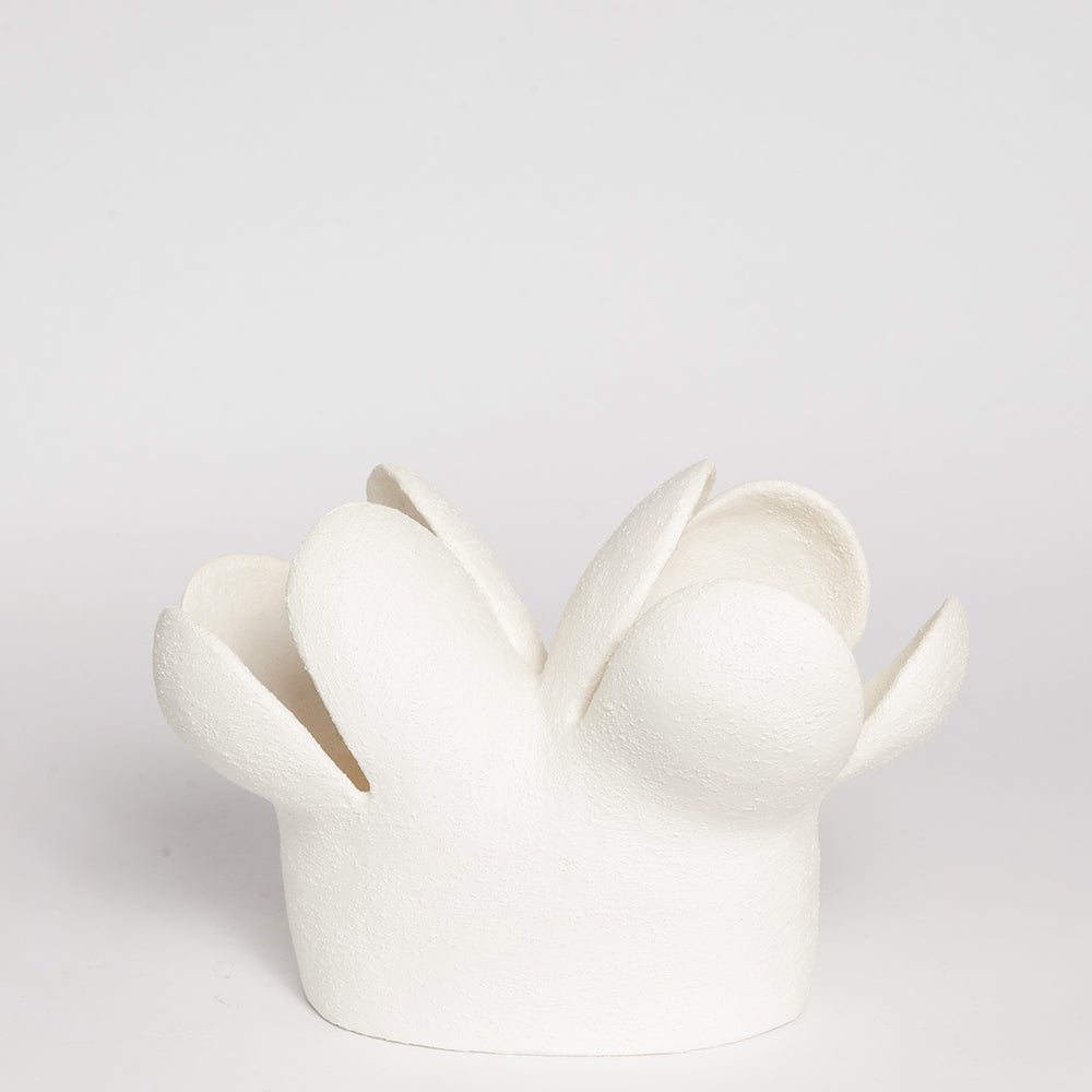 STEPHANIE PHILLIPS is a ceramic artist from Sydney, Australia. Through her background and upbringing, Stephanie has developed an affinity with the Australian bush and the influence of the forms and colours of native flora are evident in her contemporary ceramic sculptures.