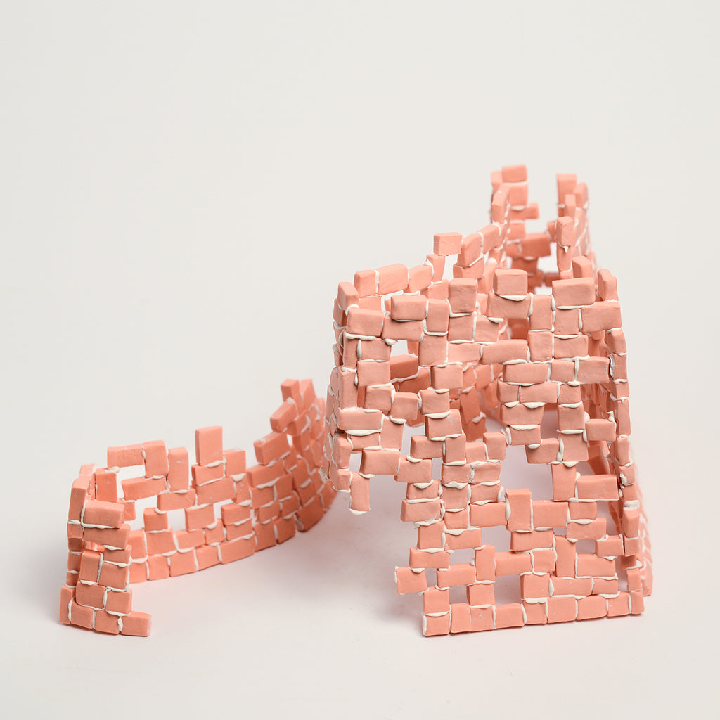 Tatt’s interest in New Materialist theories informs the technique of assembling multiple porcelain tesserae or cut and refined ceramic tiles. The physicality of individual assemblage of tesserae creates abstract forms of balance and precarity, layers, stacks, pattern and negative spaces. Using hyper focusing as a perceptive and making strategy, concentrating on the individual tesserae tile she considers their relationship and action with other objects and the surrounding environment.