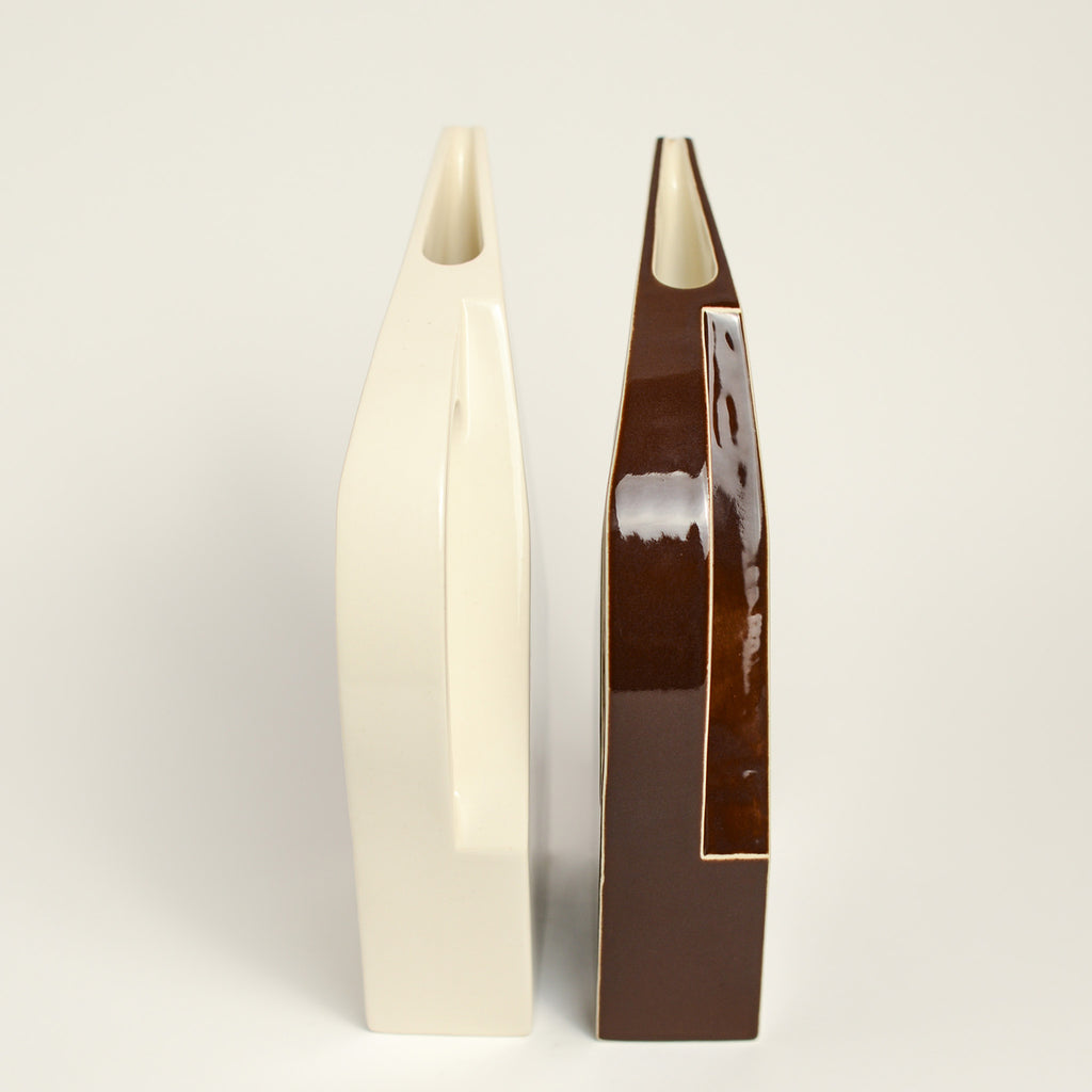 Ceramic jug handmade by Yuro Cuchor using handbuilding techniques. Yuro is an Australian ceramicist based in South Australia where he creates contemporary ceramics featuring geometrical forms and bold colours.