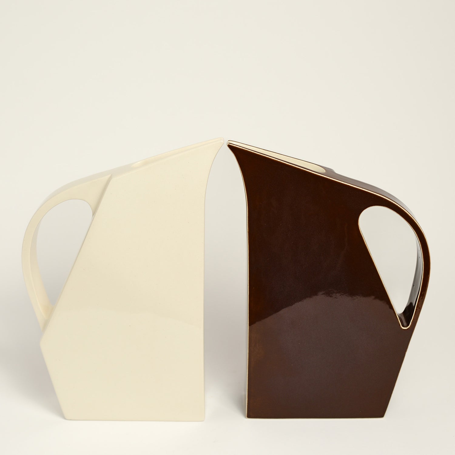 Ceramic jug handmade by Yuro Cuchor using handbuilding techniques. Yuro is an Australian ceramicist based in South Australia where he creates contemporary ceramics featuring geometrical forms and bold colours.