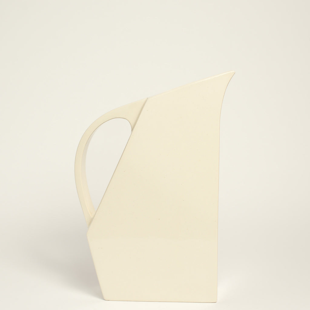 Ceramic jug handmade by Yuro Cuchor using handbuilding techniques. Yuro is an Australian ceramicist based in South Australia where he creates contemporary ceramics featuring geometrical forms and bold colours.