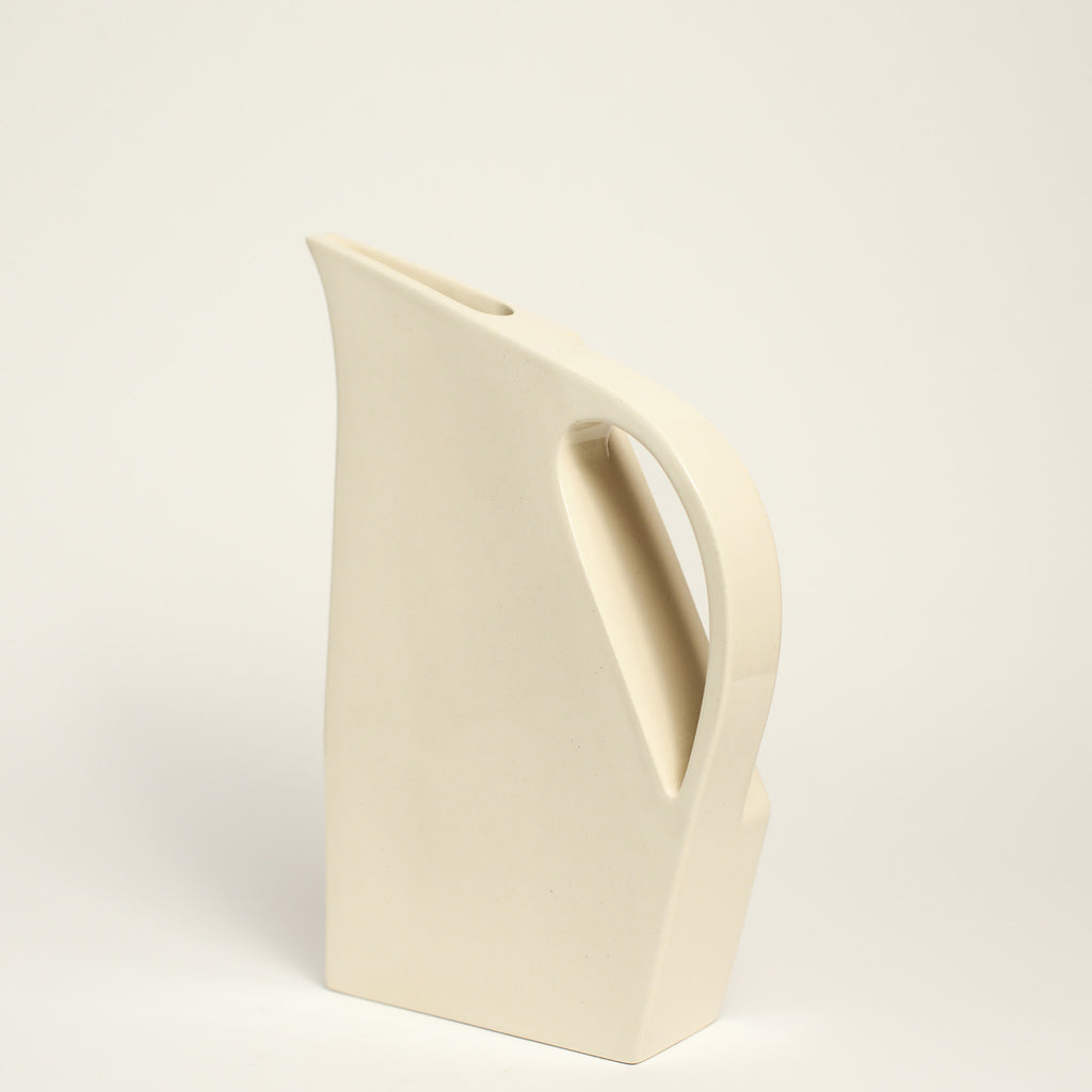 Ceramic jug handmade by Yuro Cuchor using handbuilding techniques. Yuro is an Australian ceramicist based in South Australia where he creates contemporary ceramics featuring geometrical forms and bold colours.