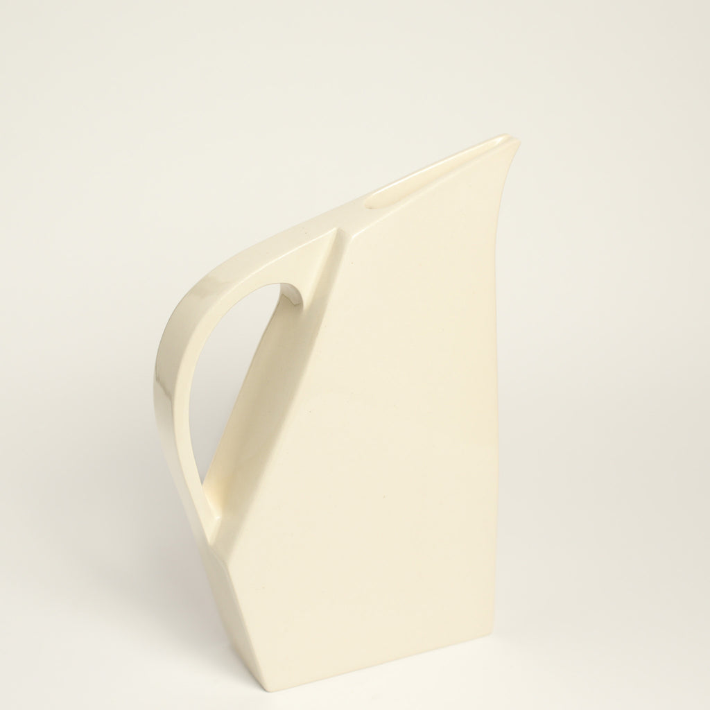 Ceramic jug handmade by Yuro Cuchor using handbuilding techniques. Yuro is an Australian ceramicist based in South Australia where he creates contemporary ceramics featuring geometrical forms and bold colours.