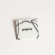 pépite origami-style gift card in its folded form, featuring a minimalist design with a black crayon-style graphic and 'pépite' logo on the front.