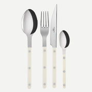 Bistrot Solid 4-piece cutlery set in Ivory by Sabre Paris, including a knife, fork, spoon, and teaspoon with ivory handles and polished stainless steel tops.