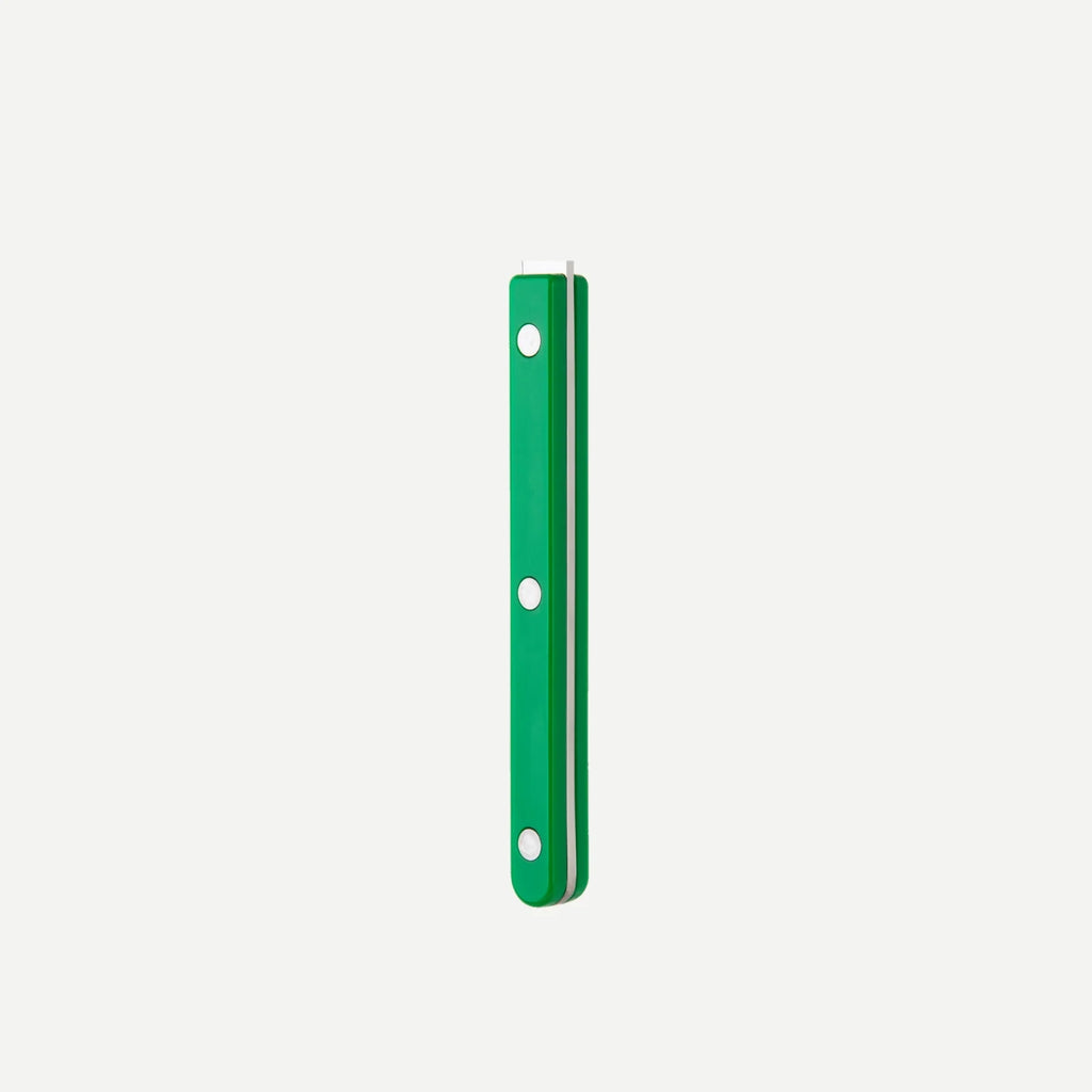 Close-up of the garden green handle from the Bistrot Solid cutlery range by Sabre Paris, highlighting its riveted design and glossy finish.