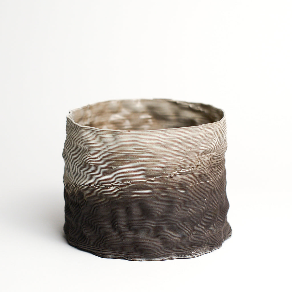 Porcelain sculpture made by Alterfact using 3D printing techniques in clay. Alterfact is an Australian duo composed of ceramicist Lucile Sciallano and designer Ben Landau based in Melbourne where they create contemporary ceramics using 3D printing techniques.