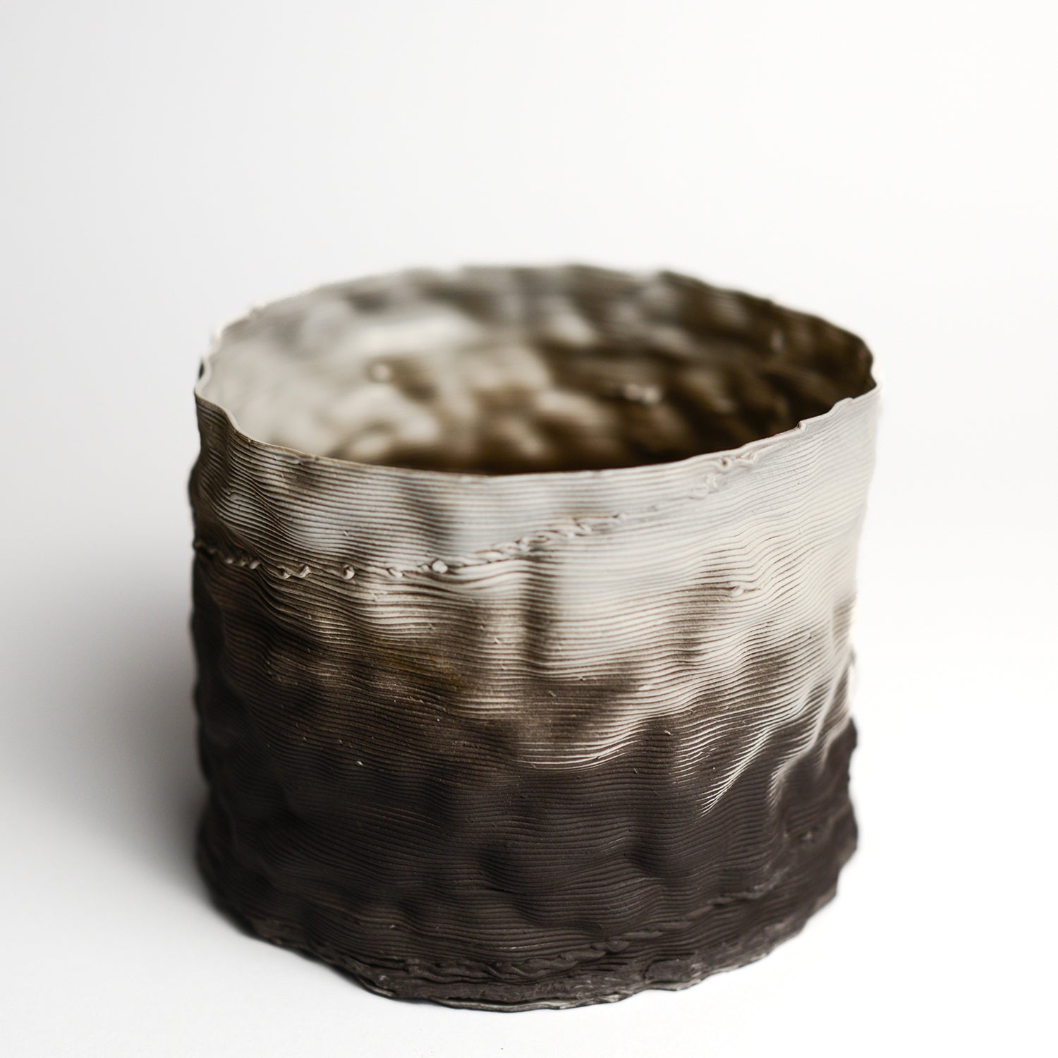 Porcelain sculpture made by Alterfact using 3D printing techniques in clay. Alterfact is an Australian duo composed of ceramicist Lucile Sciallano and designer Ben Landau based in Melbourne where they create contemporary ceramics using 3D printing techniques.