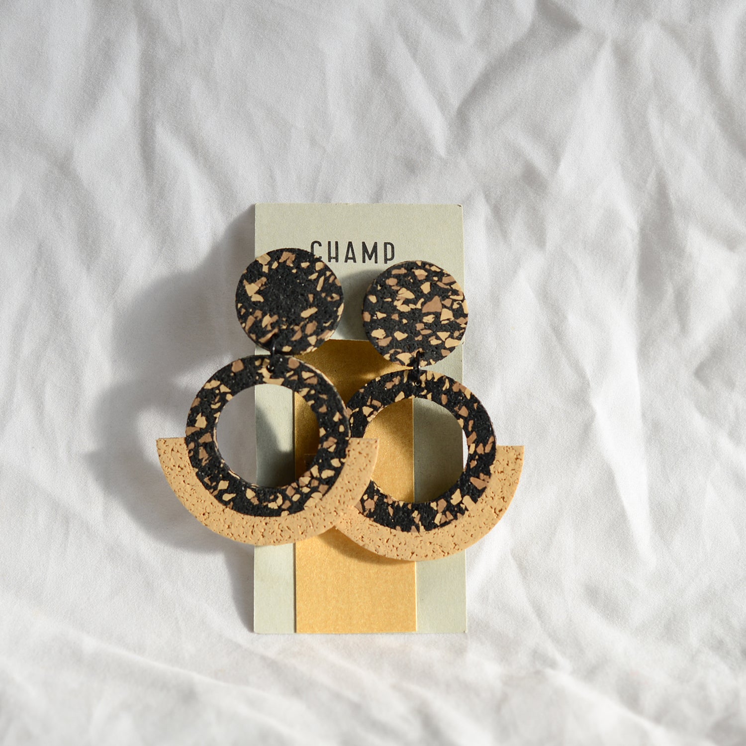 Champs earrings are made from recycled tyres and new rubber with high grade surgical steel posts and findings.